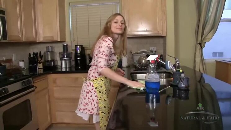 Hairy Heidi pleasures herself in the kitchen.