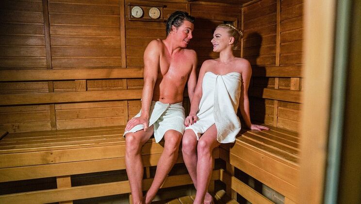 Sultry Blonde Seduces in Sauna Bliss